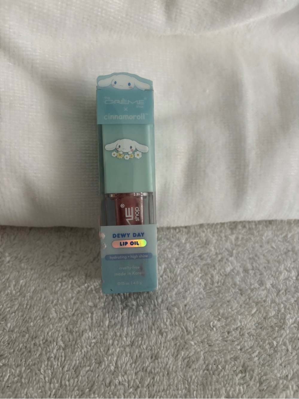 The Crème x Cinnamoroll Dewy Day Lip Oil peony